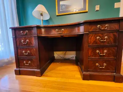 In perfect condition. Leather top. Mahogany wood. Scratch free. Smoke free home. Will include the la...