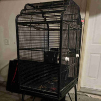 Large bird cage comes with bowls and wheels