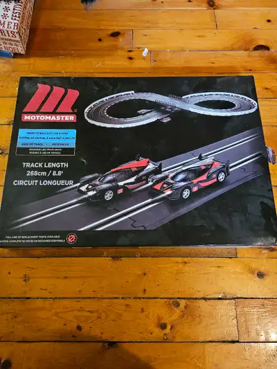 Get ready for high-speed thrills with this pre-loved MotoMaster slot car racing system, which featur...