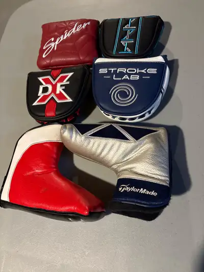 5 putter head covers 1. Odessey Blue and White Stroke lab mallet with magnetic closure. 2. LAB Golf...