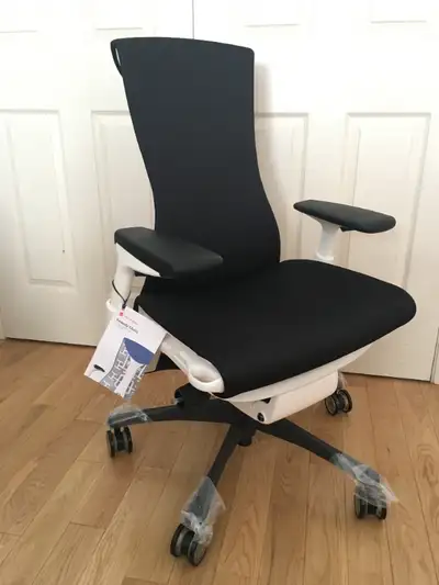 New Herman Miller white Embody chair, standard height, adjustable arms and seat, black graphite base...