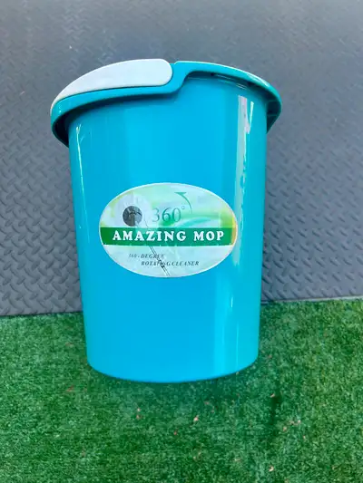 360 Degree Amazing Mop bucket. This includes a blue bucket and white spinning basket. The bucket has...