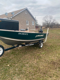 14 Foot Legend Pro Sport with like new 15 Suzuki and trailer