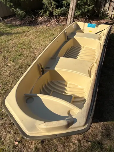 12 ft Jon boat purchased new March 2025, only used a couple times. Seats 2 and very stable with rod...