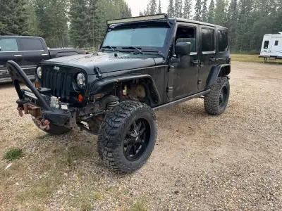 Take a look at this 2012 Jeep Rubicon, an off road Jeep ready for adventure! This rugged ride has se...