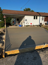 Concrete pads, walkways and driveways 