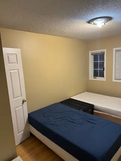 Room for rent upstairs in a house for two girls. Available now.