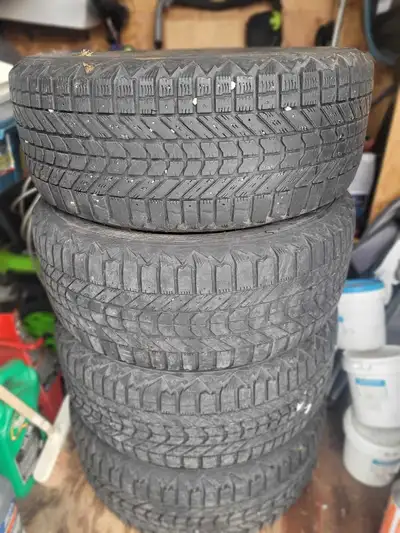 Set of 4 used winter tires on rims. Firestone Winterforce M & S. Off of a 2015 Ford Escape. Tires ar...