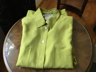 1.Jaeger long sleeved,100% silk blouse,size L. 2.Tommy Bahama short sleeved 100% silk blouse,size L....