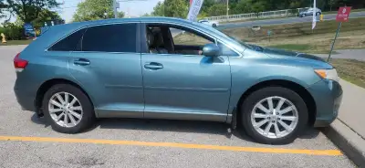 Check out this sleek, used Toyota Venza, a crossover SUV designed for comfort and versatility, perfe...