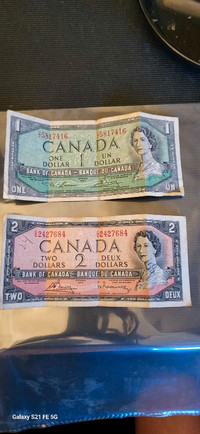 Old Canadian money  1&2 dollar bills 