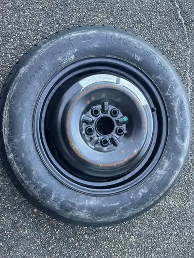 Genuine OEM 17-inch compact spare tire and wheel rim in excellent condition. Tire Size: T155/90R17 R...
