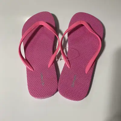 Pink brand new flip flops size 9