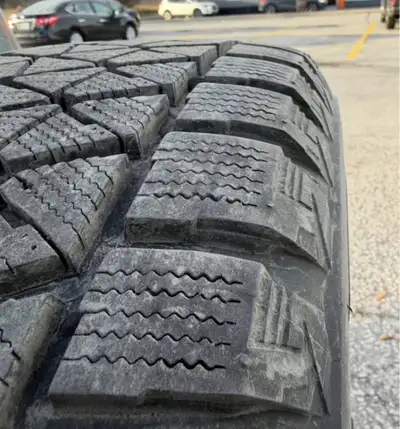 Like new winter tires on rims with sensors used for one season. Bridgestone Blizzak 255/55R18 on bla...