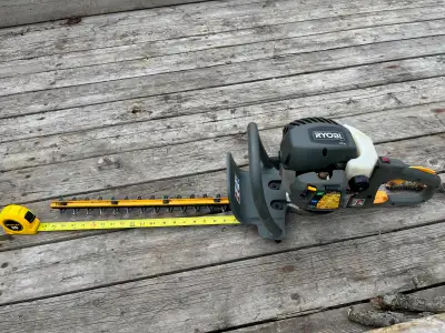 I have a Ryobi gas hedge trimmer. Works well. rotatable handle. 20", dual sided cutter bar. Still sh...