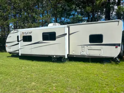 Great condition, Outdoor Kitchen and Bunkhouse, selling as we got a larger trailer, $18,000 obo
