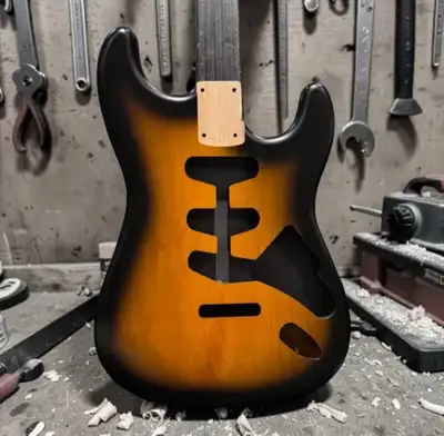 Here is an FTS Alder Tibacvo Burst Strat body with a nitro finish. Weighs 4 lbs 1 oz Price is OBO Al...