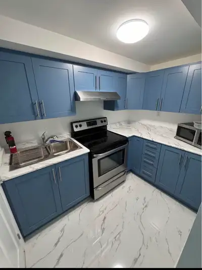 Bright, clean, fully furnished one-bedroom basement apartment with a private entrance in a quiet fam...