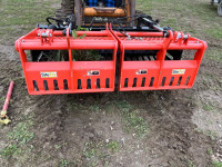 Grapple attachment for skids steer
