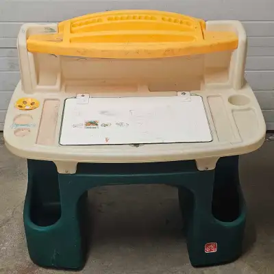 34 tall x 33 wide x 20 inches long Front board is a whiteboard Has storage for stationery, and 2 sec...