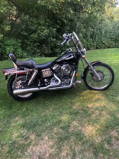 Selling my used 1993 Harley-Davidson Dyna Wide Glide, a true classic cruiser with timeless style. Th...