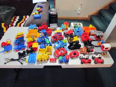 A rather large collection of Duplo Lego vehicles. All Lego, no Lego like brands except for the large...
