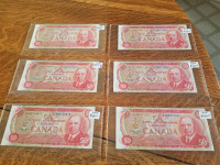 3 1975 50$ bills in great condition only 100$ each. 2264489639.