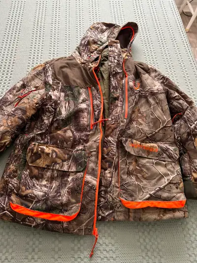 Mossy Oak design; cargo pants lg. ($25), Wrangler camo jeans 32x32 ($25), cargo nylon overpants lg....