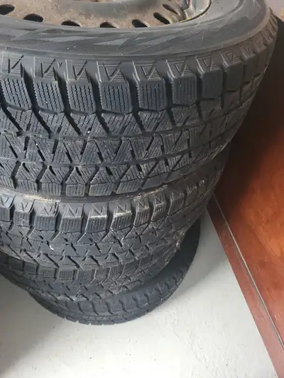 235/65R17 Bridgestone Winter tires on rims. Only used 1 winter. 3000kms Honda CRV Rims have slight s...