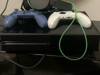 Xbox one with two controllers.