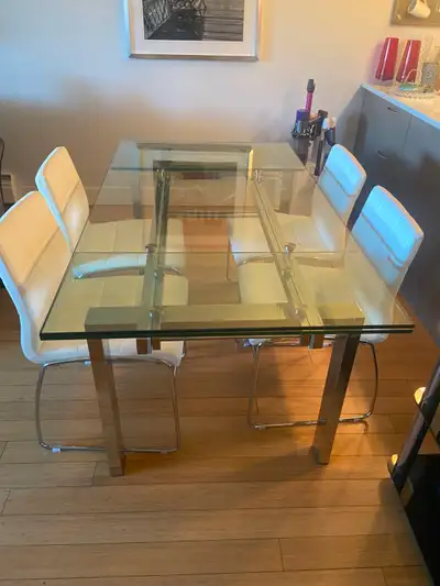 Structube table and four chairs-purchased from The Bay. Glass and chrome dining table with pull out...