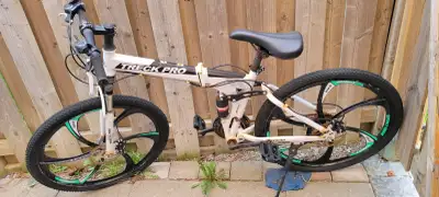 Bicycle for sale -it comes with gears, bell.-TREK PRONeeds  oil, View more