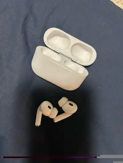 Rarely used Apple AirPods. The case and earbuds have some cosmetic wear, as shown in the images.