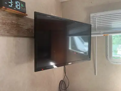 32” RCA tv with wall mount, View more