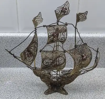 Beautiful hand made beautiful craftsmanship filgree using materials like silver and copper and gold...