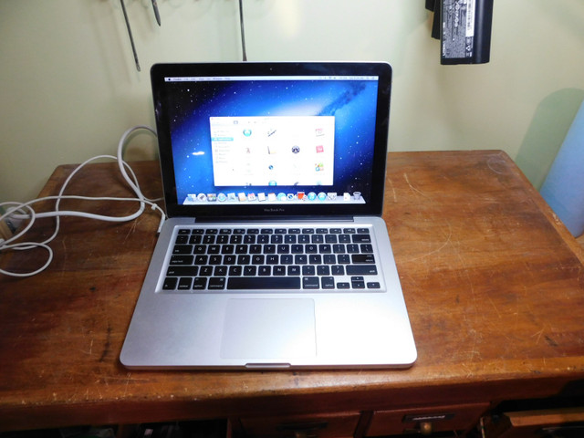 MacBook PRO 2009 14"  Core 2 Duo 160GB 2GB Mountain Lion 10.8.5 in Laptops in Peterborough
