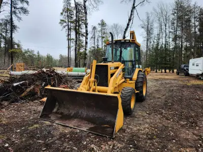 1998 turbo 410 john deere backhoe. Owned for 3 years, did all my work around yard without issue. Don...