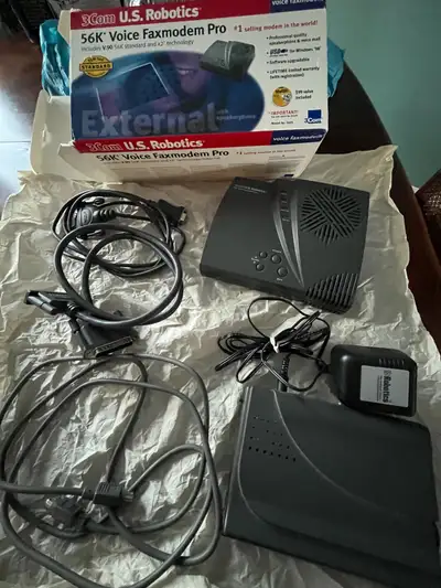 I'm offering two useable vintage fax modems, a 3Com U.S. Robotics 56K Voice Faxmodem Pro and a U.S....