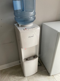Used Primo hot n cold electric water dispenser 