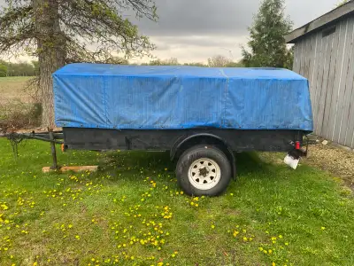 6x10 covered trailer ,cover can be removed easily to make open trailer also come with ramp tailgate...