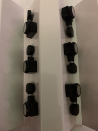 Two Sets of Locking Tuners