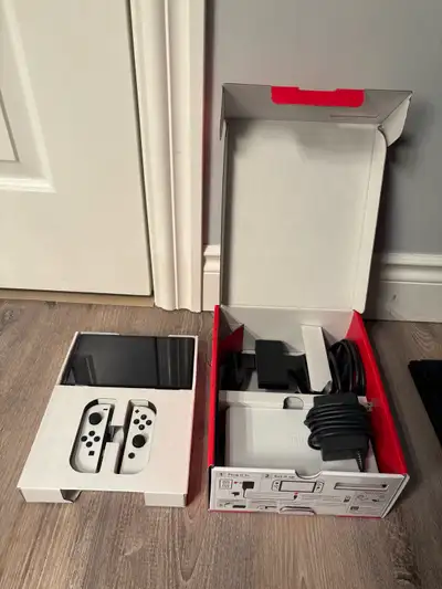 Nintendo Switch OLED + a game, View more