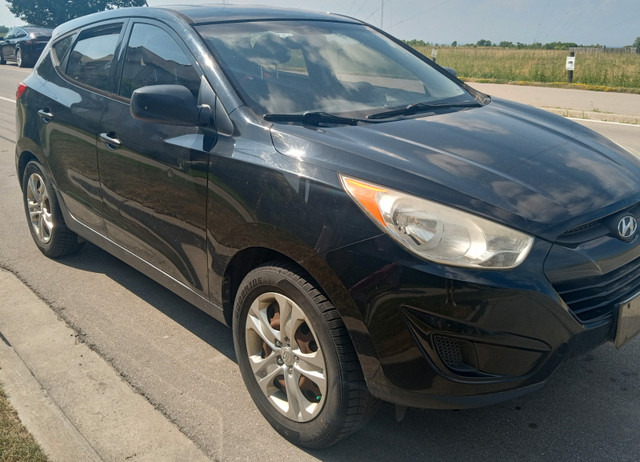2014 Hyundai Tucson 5 speed, 2 Sets of Tires on Rims , ICE AC in Cars & Trucks in Hamilton - Image 2