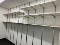 Wall shelving with brackets and shelves