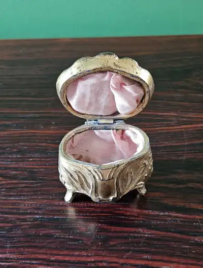 1890-1910 metal ring box with what seems to be the original padded lining. Measures approx 2" high X...