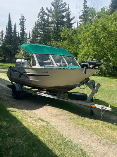 1625 Harbercraft boat with 75 Honda four stroke outboard and galvanized Ez Loader trailer. Comes wit...