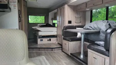 Come check this clean unit out, just in time for summer fun. F450, one nice big slide out makes dini...