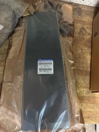 This is a brand new trim piece for rear side door window trim part number 0053155451–001 Mopar