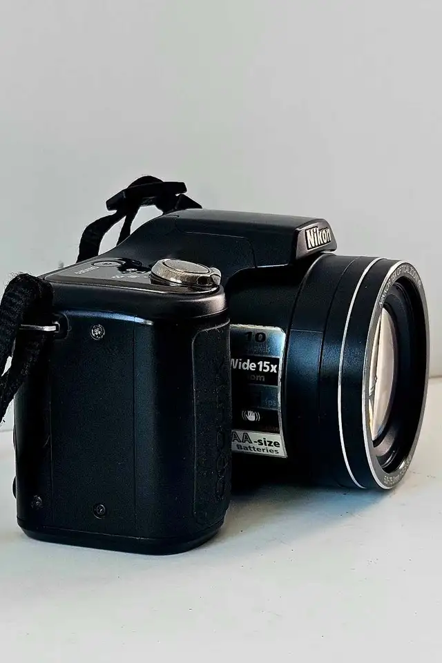 Nikon CoolPix L-100 10-MPDigital Camara - pls. Read Description 63234753761923122