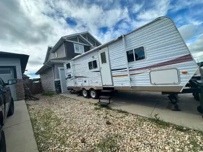 I started painting inside a couple years ago but it’s not finished. Trailer has rear bunks in back a...